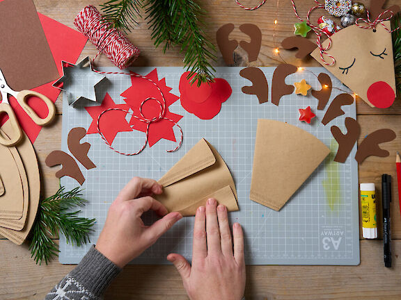 Schritt 1: Filtertüten umknicken